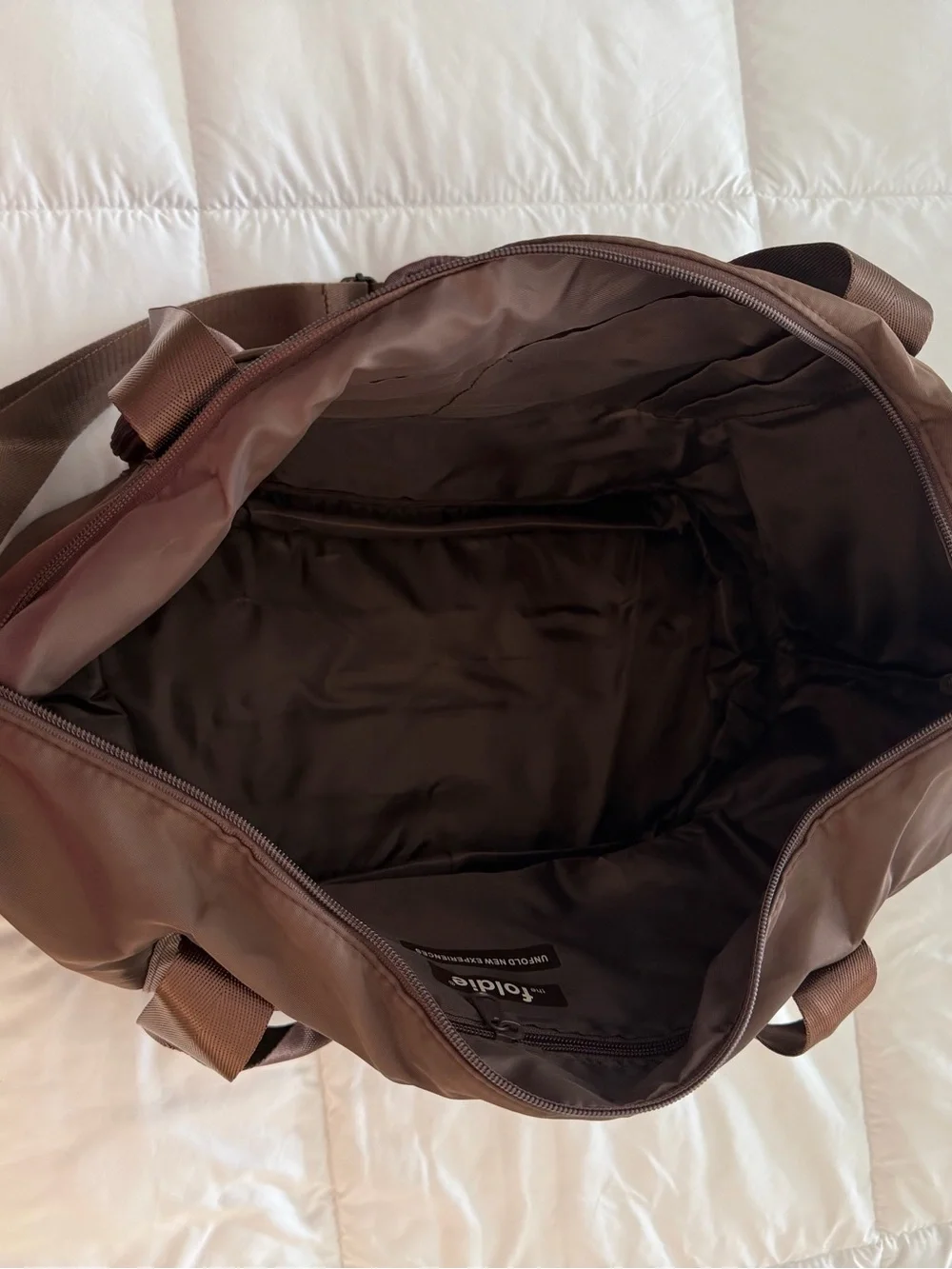 The Foldie travel bag in brown